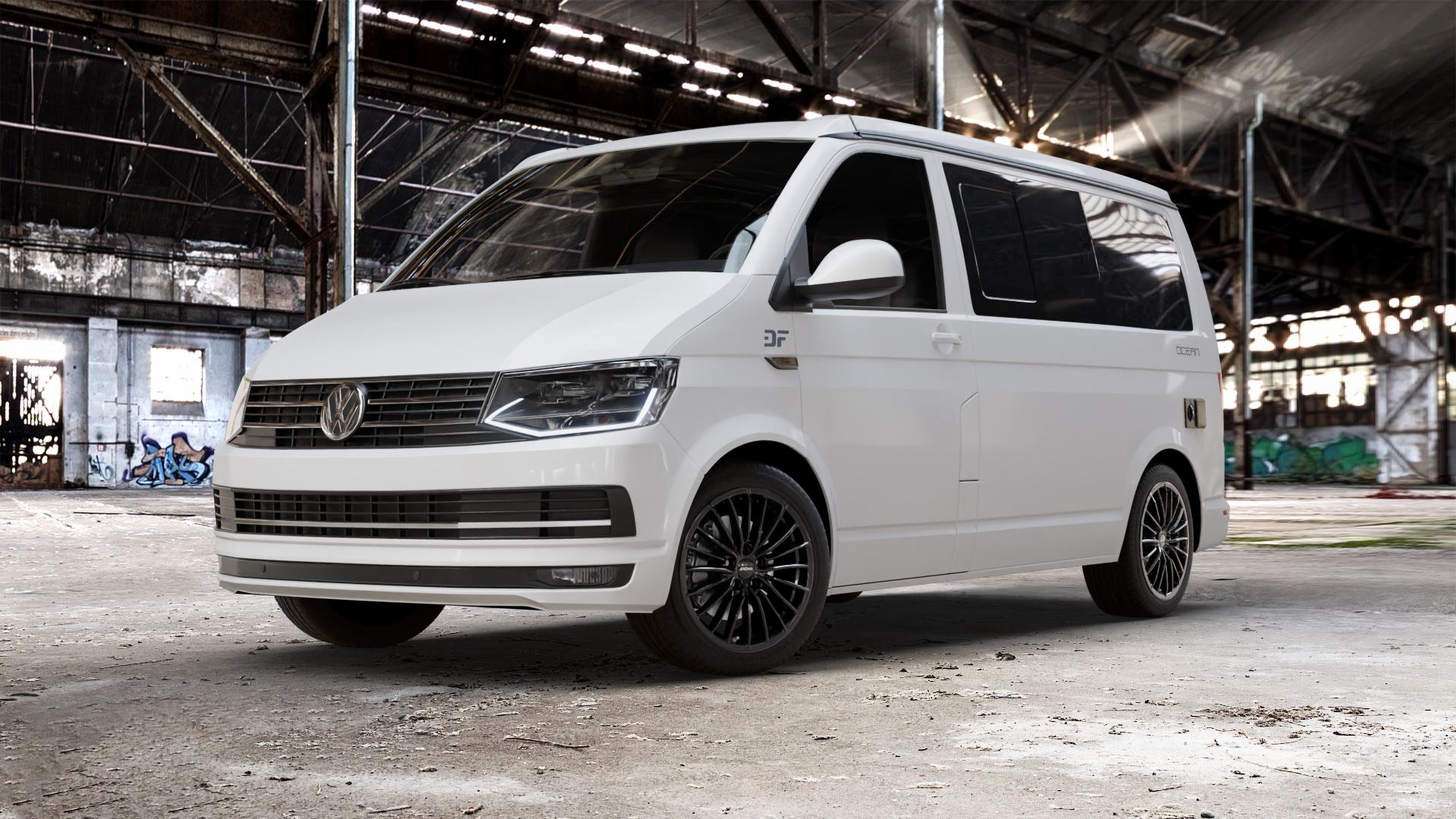 RONAL R68 JETBLACK Felge mit Reifen schwarz in 18Zoll Winterfelge Alufelge auf weissem Volkswagen (VW) T6 California Beach ⬇️ mit 15mm Tieferlegung ⬇️ Old Industrial Hall_max_5300mm_2024 Frontansicht_1
