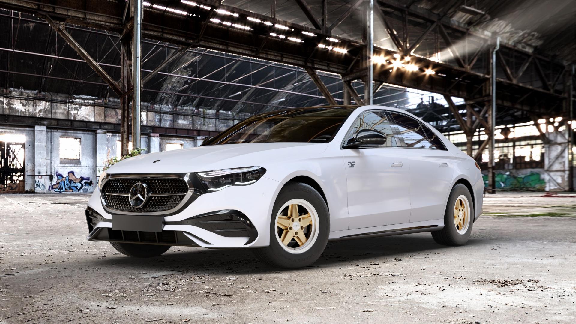 RONAL R9 RACING GOLD HORNKOPIERT Felge mit Reifen silber in 15Zoll Winterfelge Alufelge auf weissem Mercedes E-Klasse Typ W214 Limousine (R2EW) ⬇️ mit 15mm Tieferlegung ⬇️ Old Industrial Hall_max_5300mm_2024 Frontansicht_1