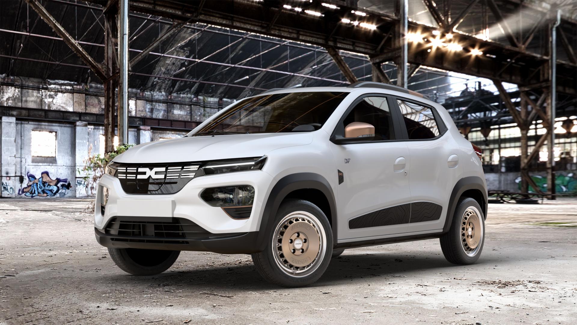 RONAL RR10 BRONZE MATT Felge mit Reifen in 15Zoll Winterfelge Alufelge auf weissem Dacia Spring Typ DBG Facelift 0,0l 19kW (26 PS) 30kW (41 ⬇️ mit 15mm Tieferlegung ⬇️ Old Industrial Hall_max_4400mm_2024 Frontansicht_1