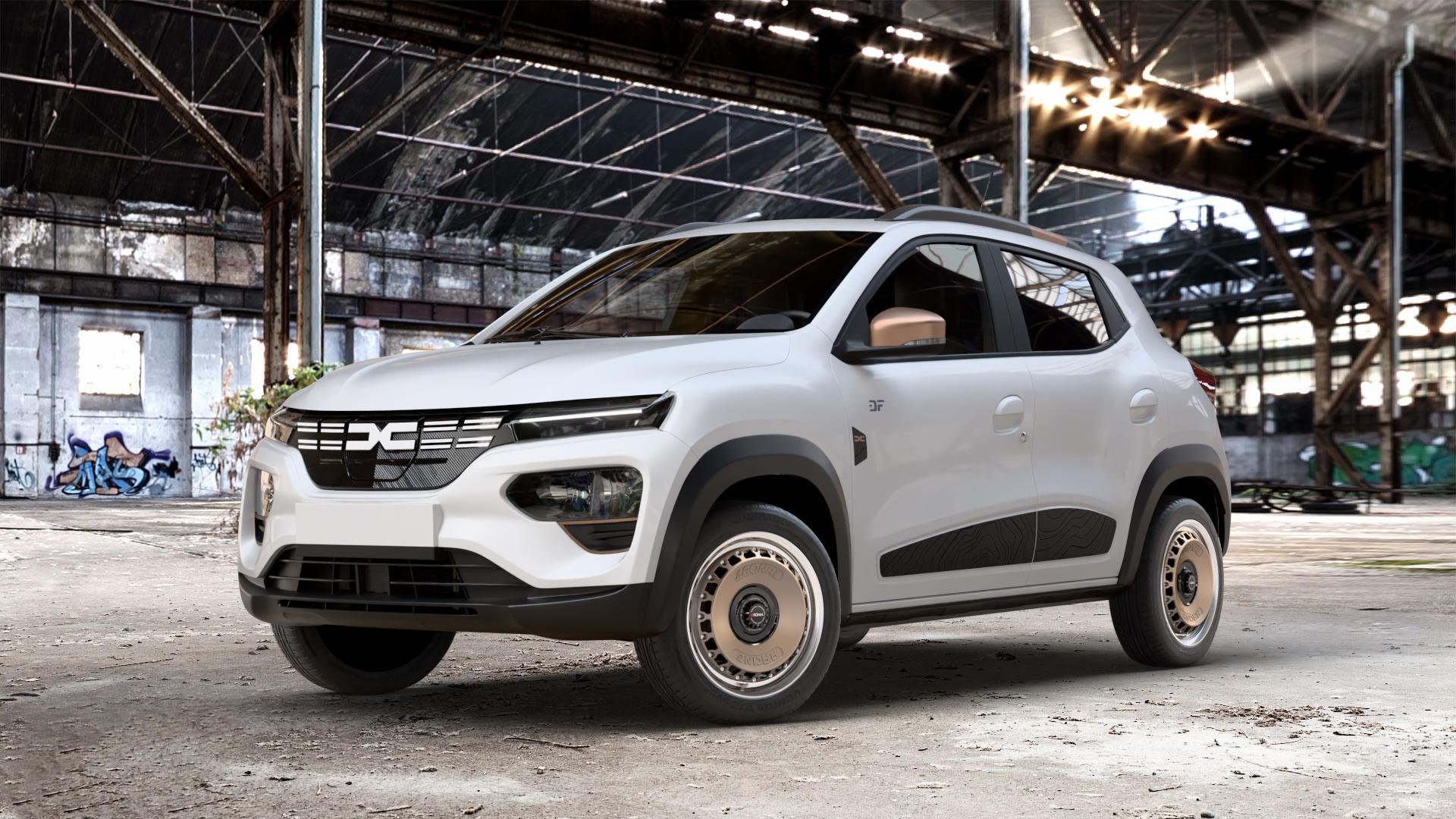 RONAL RR10 REV B BRONZE MATT Felge mit Reifen in 15Zoll Winterfelge Alufelge auf weissem Dacia Spring Typ DBG Facelift 0,0l 19kW (26 PS) 30kW (41 ⬇️ mit 15mm Tieferlegung ⬇️ Old Industrial Hall_max_4400mm_2024 Frontansicht_1