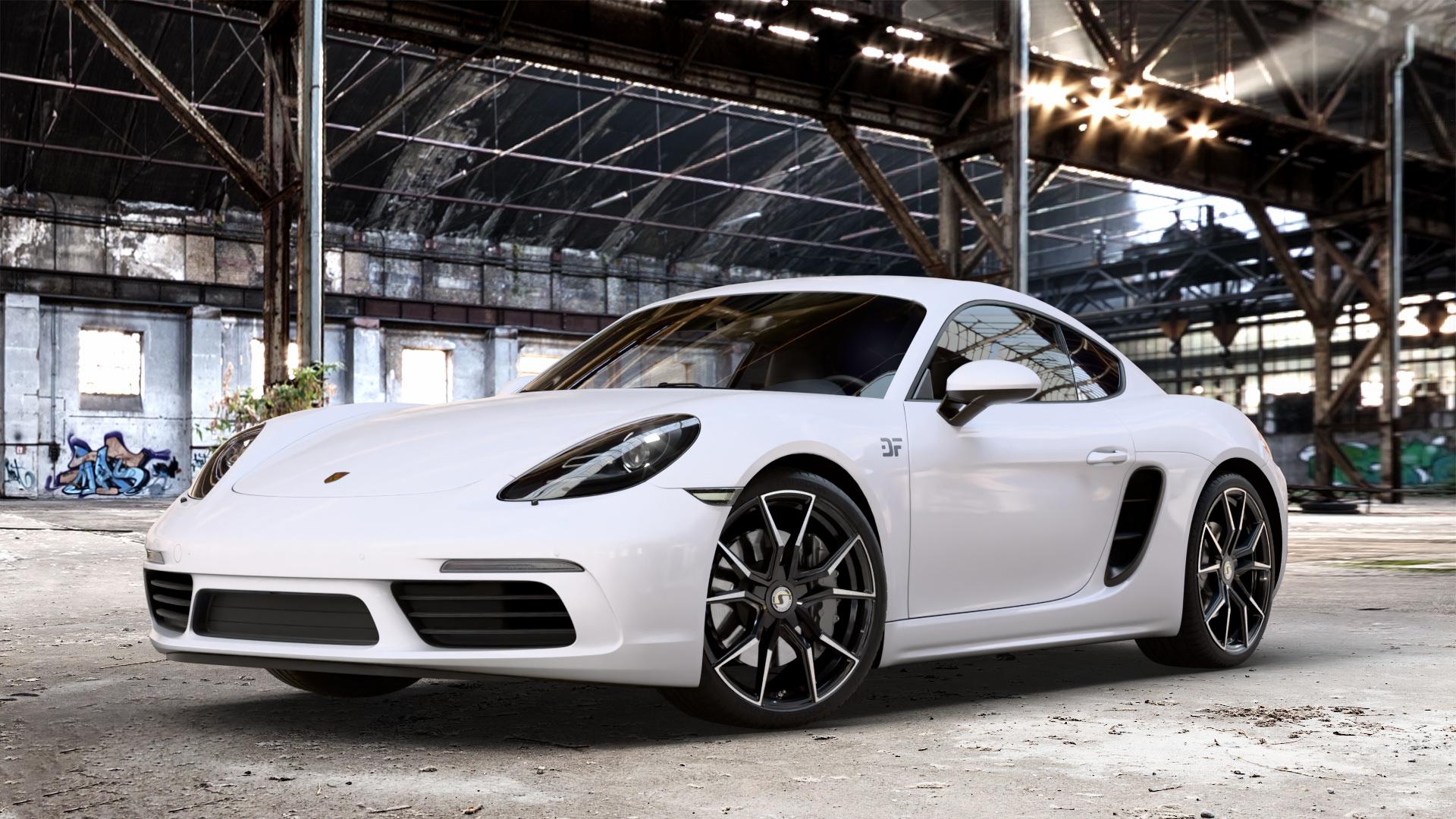 SchmidtRevolution Schmidt Drago Softhorn HellCat Black Felge mit Reifen silber schwarz in 20Zoll Alufelge auf weissem Porsche 718 Cayman Typ 982 ⬇️ mit 15mm Tieferlegung ⬇️ Old Industrial Hall_max_4400mm_2024 Frontansicht_1
