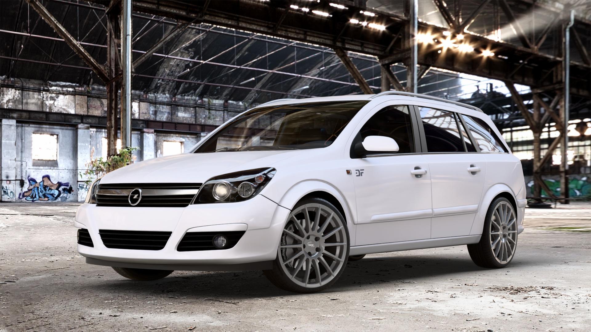 Tec Speedwheels AS2 Gun Metal Felge mit Reifen grau anthrazit in 19Zoll Winterfelge Alufelge auf weissem Opel Astra H Typ A-H Caravan A-H/SW ⬇️ mit 15mm Tieferlegung ⬇️ Old Industrial Hall_max_4400mm_2024 Frontansicht_1