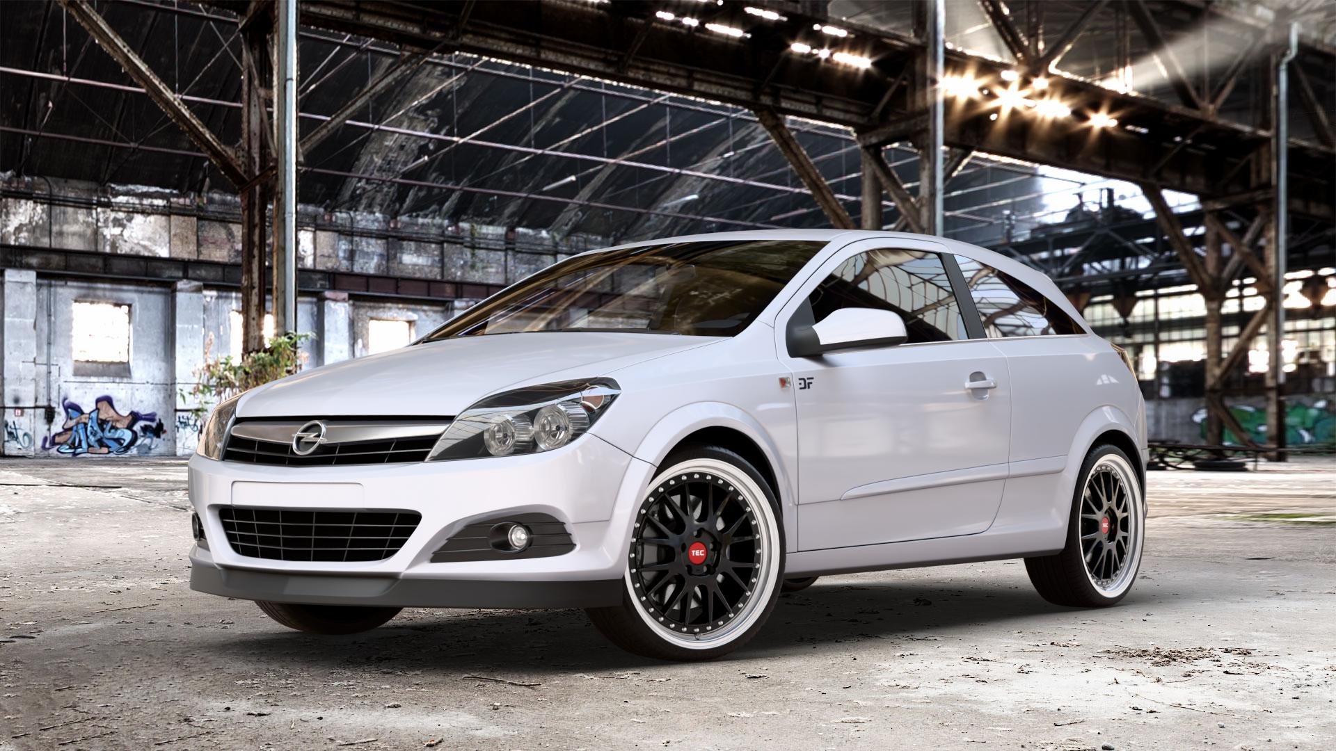Tec Speedwheels GT EVO Schwarz Glanz Hornpoliert Felge mit Reifen silber mehrfarbig in 19Zoll Alufelge auf Weiss Uni Opel Astra H GTC Typ A-H/C ⬇️ mit 15mm Tieferlegung ⬇️ Old Industrial Hall_max_4400mm_2024 Frontansicht_1
