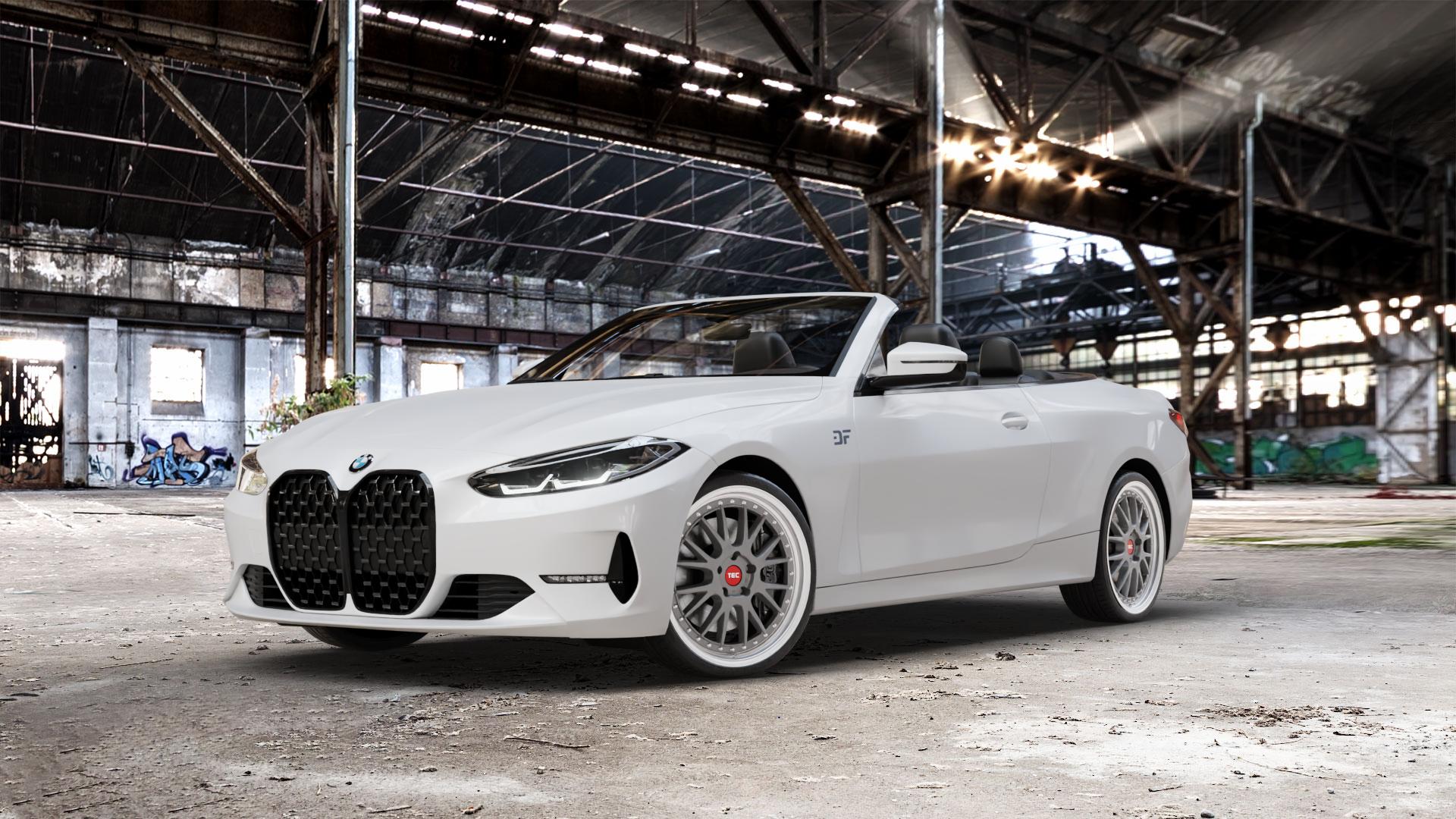 Tec Speedwheels GT EVO Titan Glanz Hornpoliert Felge mit Reifen grau silber mehrfarbig in 20Zoll Alufelge auf weissem BMW M4 Typ G83 (Cabrio) 4er G23 Cabrio (G3C) ⬇️ mit 15mm Tieferlegung ⬇️ Old Industrial Hall_max_5300mm_2024 Frontansicht_1