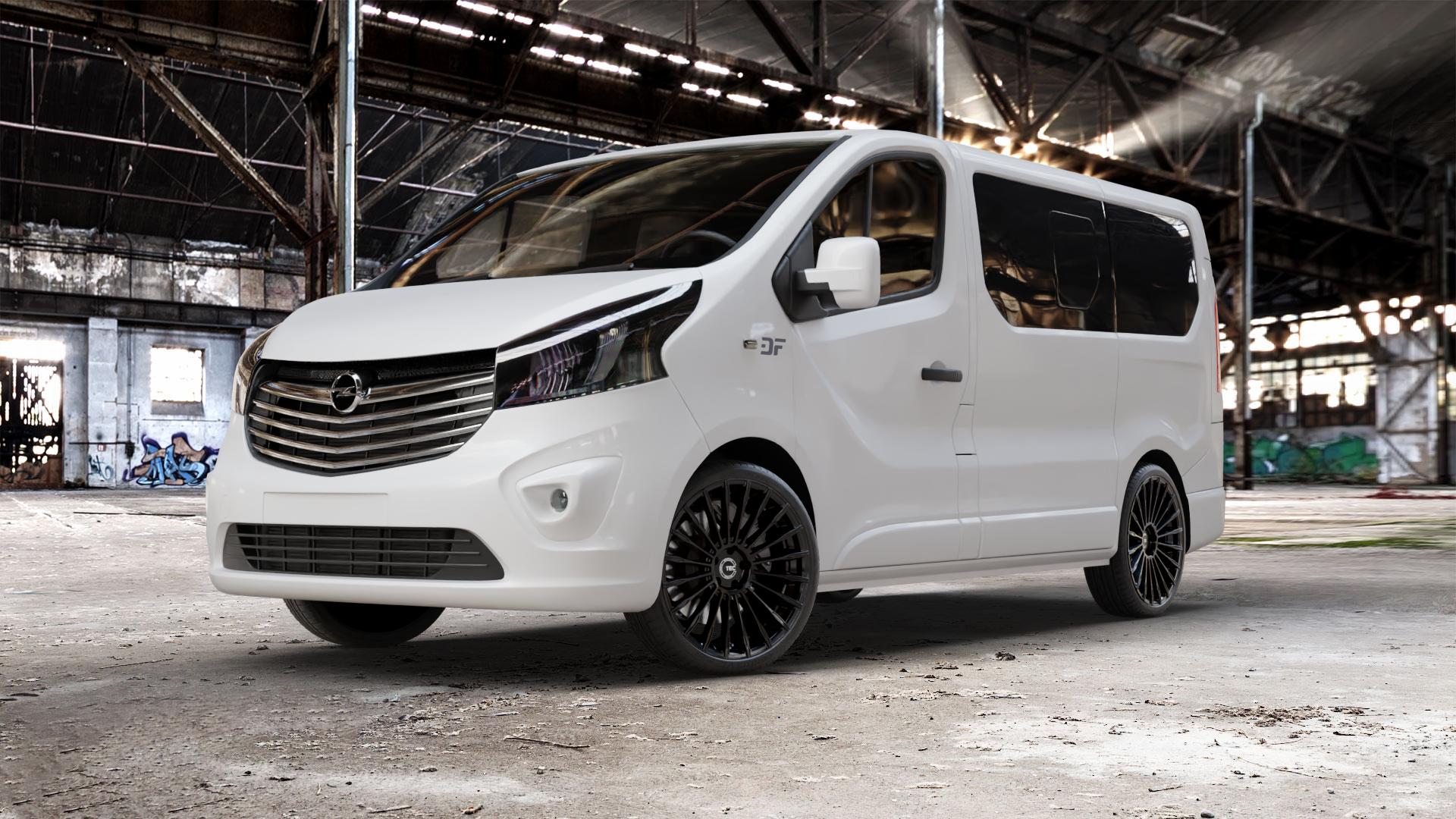Tec Speedwheels GT5 Schwarz Glanz Felge mit Reifen in 20Zoll Winterfelge Alufelge auf weissem Opel Vivaro B Kombi Typ X83 ⬇️ mit 15mm Tieferlegung ⬇️ Old Industrial Hall_max_5300mm_2024 Frontansicht_1