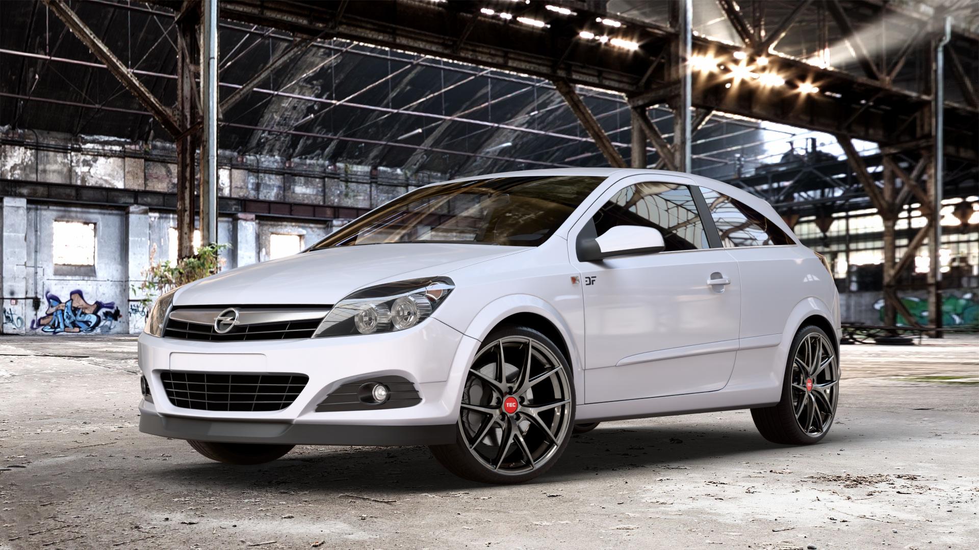 Tec Speedwheels GT6 EVO Hyper Black Felge mit Reifen grau schwarz anthrazit in 19Zoll Winterfelge Alufelge auf Weiss Uni Opel Astra H GTC Typ A-H/C ⬇️ mit 15mm Tieferlegung ⬇️ Old Industrial Hall_max_4400mm_2024 Frontansicht_1