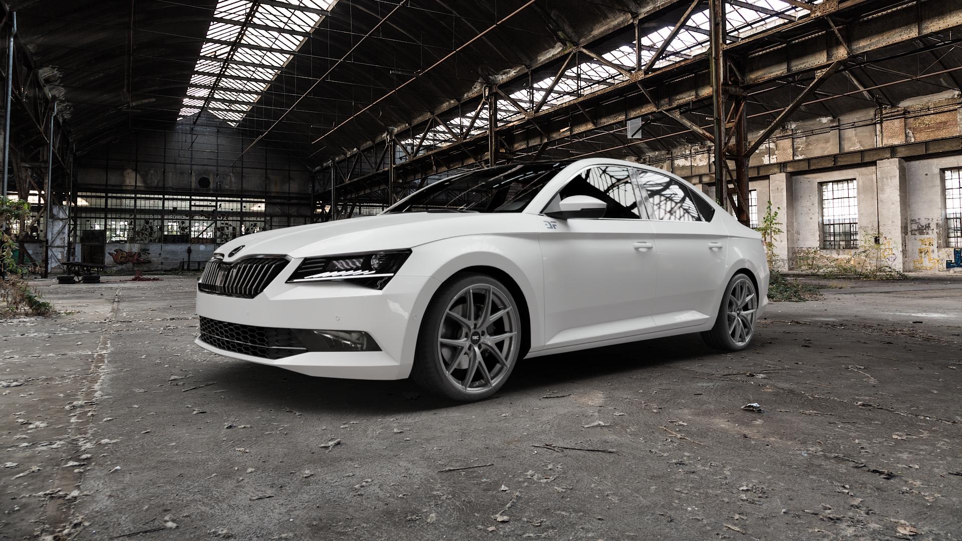 Tec Speedwheels GT6 EVO Hyper Black Felge mit Reifen grau schwarz anthrazit in 19Zoll Winterfelge Alufelge auf weissem Skoda Superb III Typ 3V ⬇️ mit 15mm Tieferlegung ⬇️ Old Industrial Hall_max5000mm_2022 Frontansicht_1