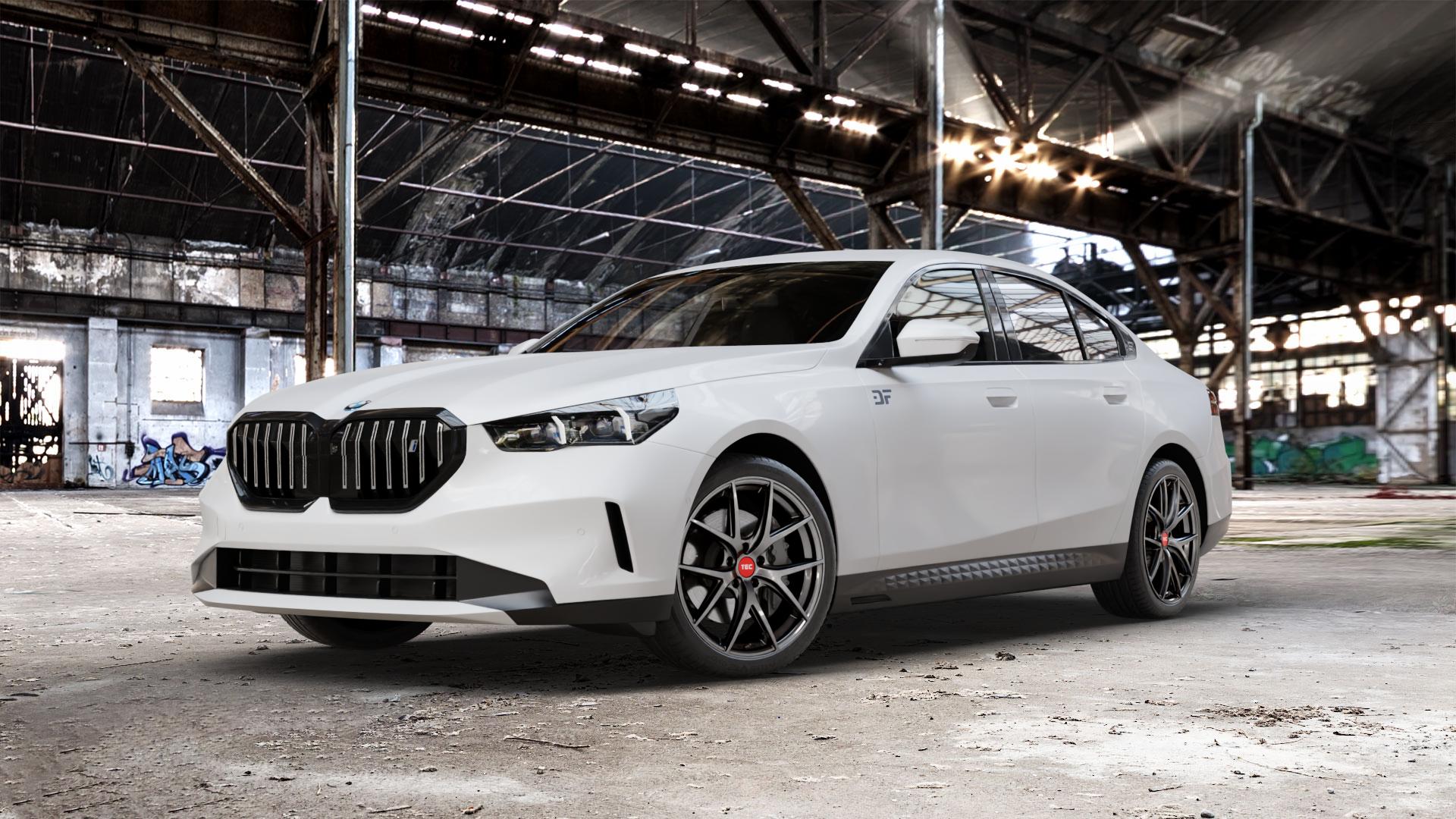 Tec Speedwheels GT6 EVO Hyper Black Felge mit Reifen grau schwarz anthrazit in 20Zoll Winterfelge Alufelge auf weissem BMW i5 (G6E) 0,0l eDrive40 105kW (143 PS) ⬇️ mit 15mm Tieferlegung ⬇️ Old Industrial Hall_max_5300mm_2024 Frontansicht_1