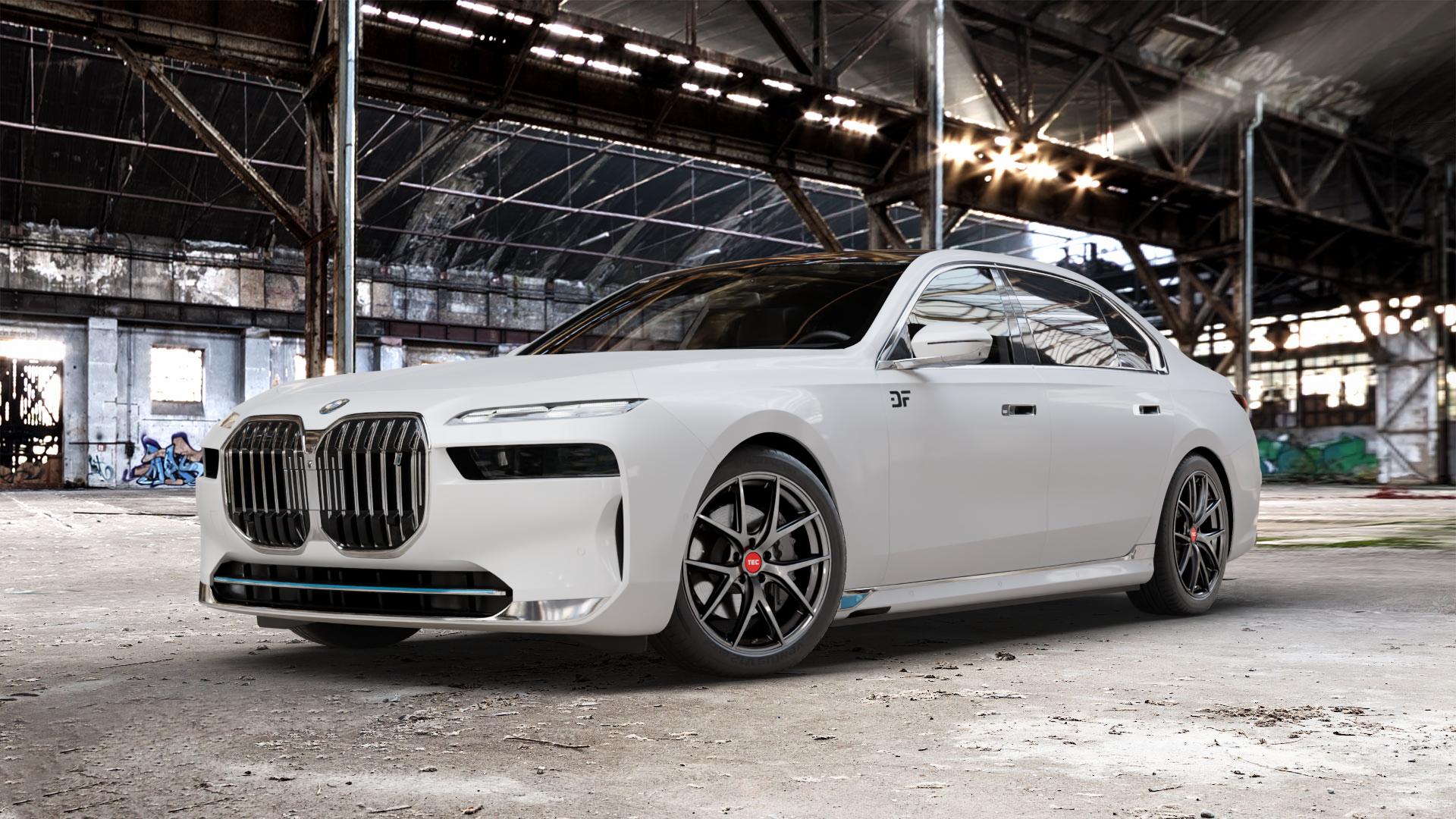 Tec Speedwheels GT6 EVO Hyper Black Felge mit Reifen grau schwarz anthrazit in 20Zoll Winterfelge Alufelge auf weissem BMW i7 Typ G70 ⬇️ mit 15mm Tieferlegung ⬇️ Old Industrial Hall_max_5300mm_2024 Frontansicht_1