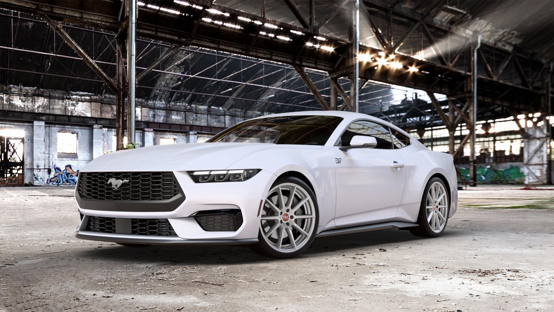 Tec Speedwheels GT7 Hyper Silber Felge mit Reifen in 20Zoll Winterfelge Alufelge auf weißem Ford Mustang VII Coupe Typ LAE ⬇️ mit 15mm Tieferlegung ⬇️ Old Industrial Hall_max_5300mm_2024 Frontansicht_1