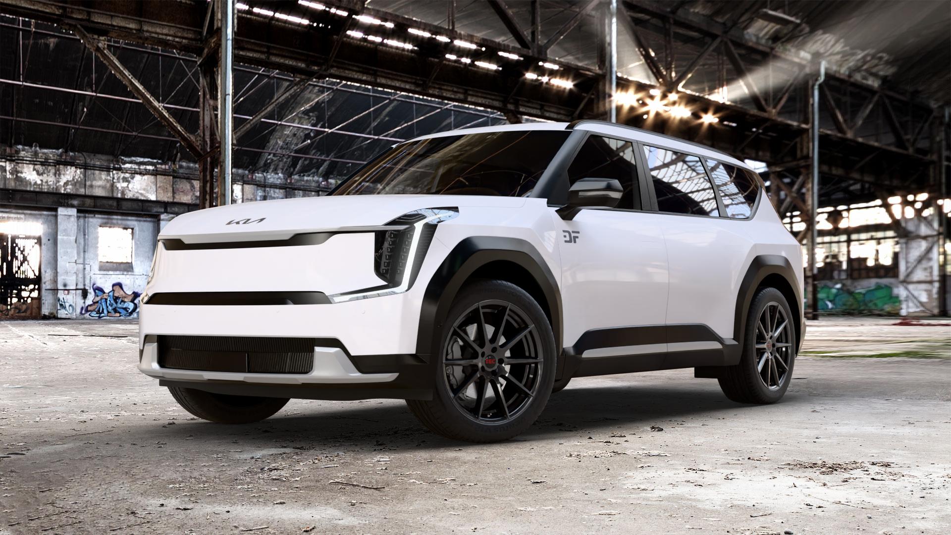 Tec Speedwheels GT7 Schwarz Glanz Felge mit Reifen in 21Zoll Winterfelge Alufelge auf weissem Kia EV9 Typ MV1 0,0l 100kW AWD (136 PS) 53kW (72 113kW GT Line (154 ⬇️ mit 15mm Tieferlegung ⬇️ Old Industrial Hall_max_5300mm_2024 Frontansicht_1