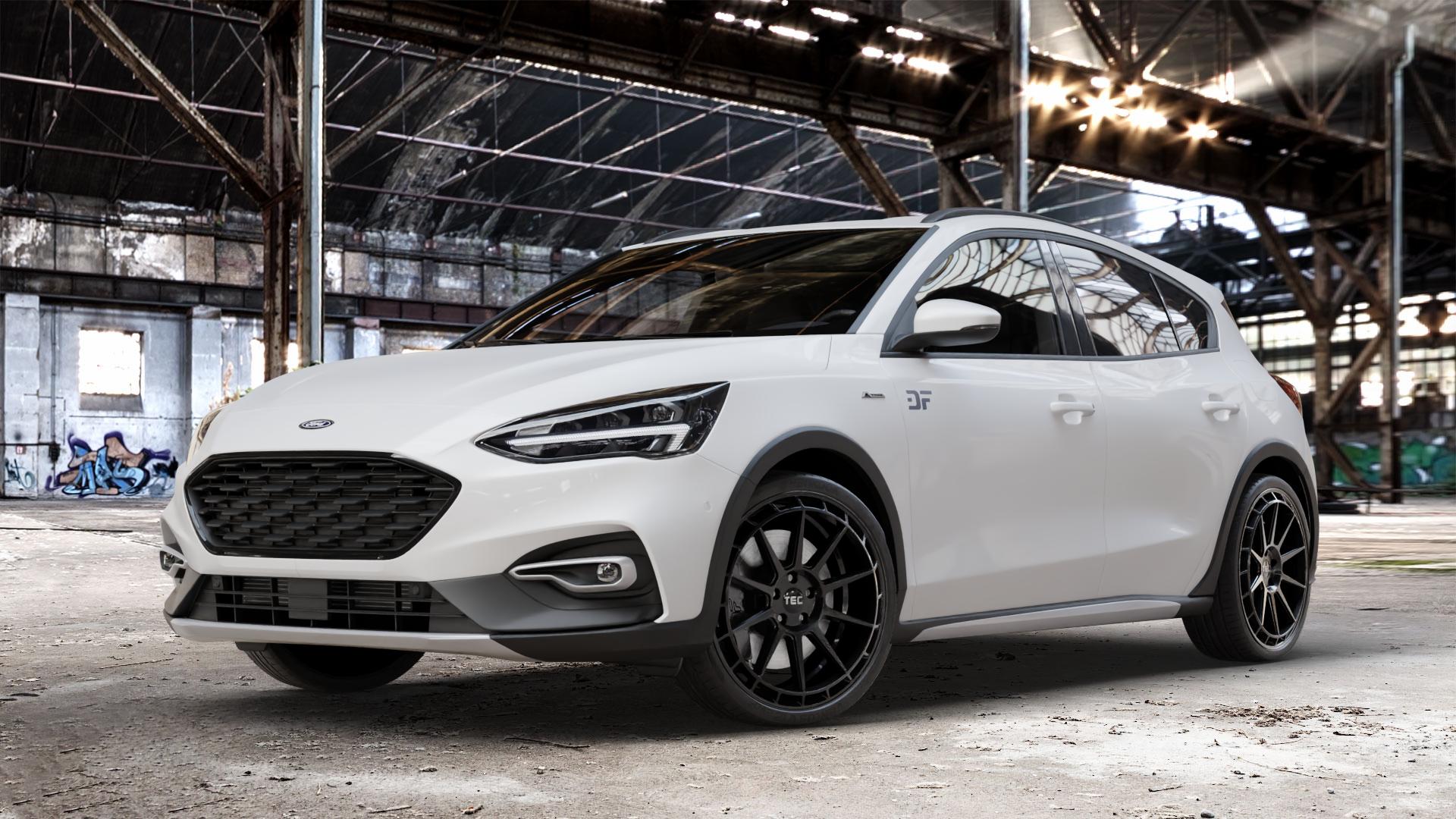 Tec Speedwheels GT8 Schwarz Glanz Felge mit Reifen in 20Zoll Winterfelge Alufelge auf weissem Ford Focus IV Active Typ DEH (Schrägheck) ⬇️ mit 15mm Tieferlegung ⬇️ Old Industrial Hall_max_4400mm_2024 Frontansicht_1