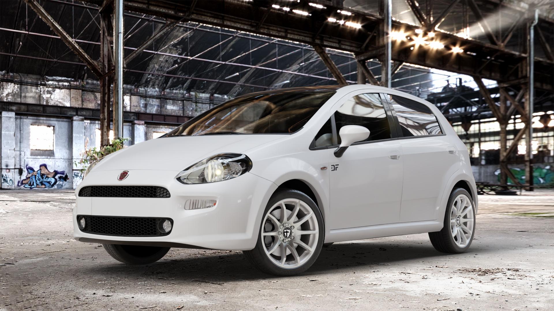 TOMASON TN1 bright silver Felge mit Reifen silber in 17Zoll Winterfelge Alufelge auf weissem Fiat Punto / Grande Typ 199 (12->) ⬇️ mit 15mm Tieferlegung ⬇️ Old Industrial Hall_max_4400mm_2024 Frontansicht_1