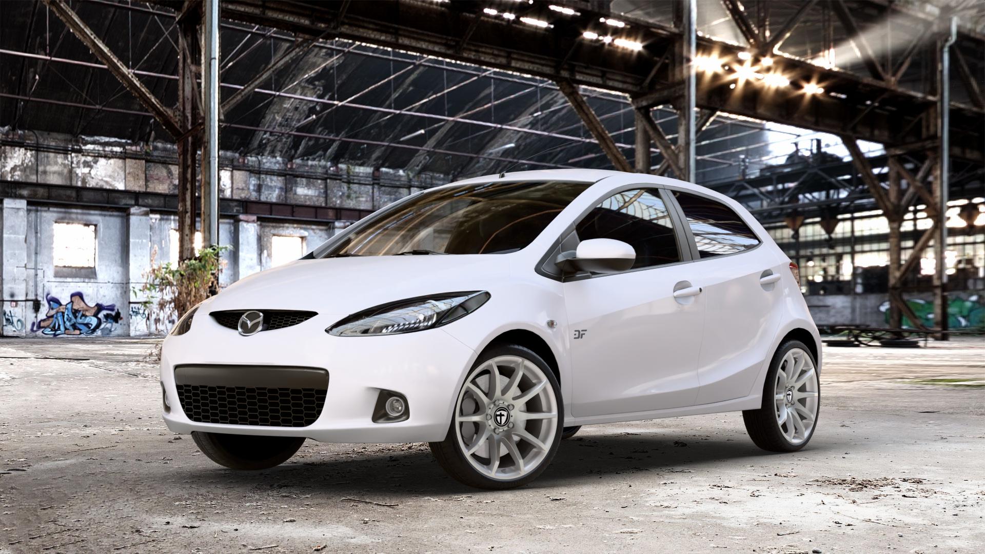 TOMASON TN1 bright silver Felge mit Reifen silber in 17Zoll Winterfelge Alufelge auf weissem Mazda 2 (07-14) (DE) 1,3l MZR 55kW (75 PS) 63kW (86 1,5l 76kW (103 1,4l MZR-CD 50kW (68 1,6l MZ-CD 66kW (90 LPG 62kW (84 70kW (95 75kW (102 ⬇️ mit 15mm Tieferlegung ⬇️ Old Industrial Hall_max_4400mm_2024 Frontansicht_1