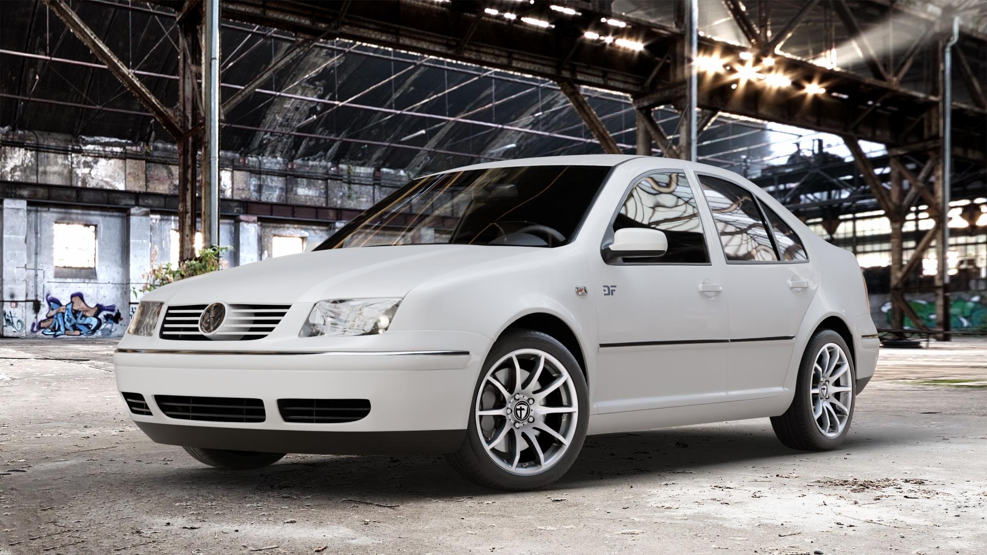 TOMASON TN1 bright silver Felge mit Reifen silber in 17Zoll Winterfelge Alufelge auf weissem Volkswagen (VW) Bora Variant ⬇️ mit 15mm Tieferlegung ⬇️ Old Industrial Hall_max_4400mm_2024 Frontansicht_1