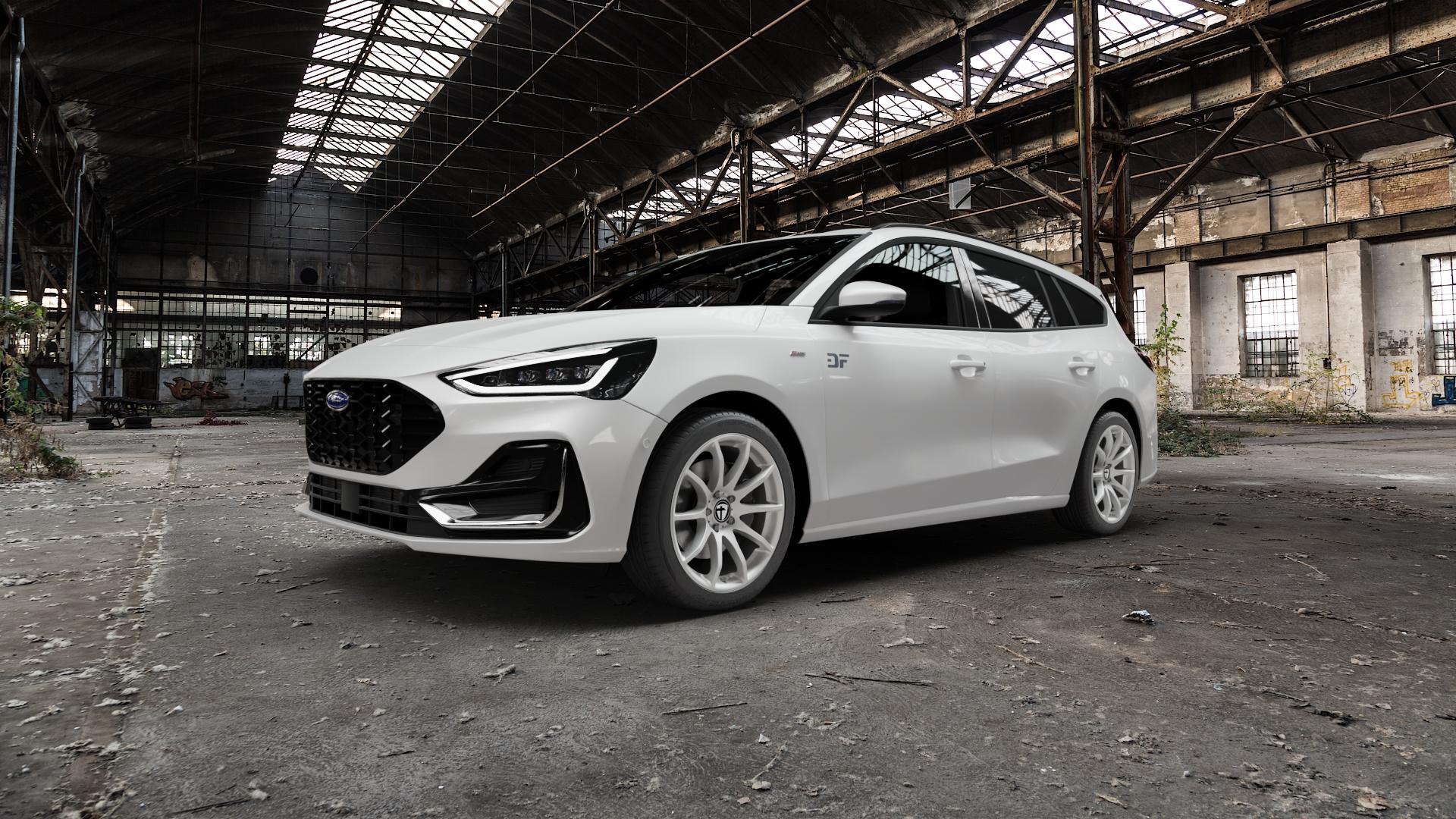 TOMASON TN1 bright silver Felge mit Reifen silber in 18Zoll Winterfelge Alufelge auf weissem Ford Focus IV Typ DEH Facelift (Turnier) ⬇️ mit 15mm Tieferlegung ⬇️ Old Industrial Hall_max5000mm_2022 Frontansicht_1