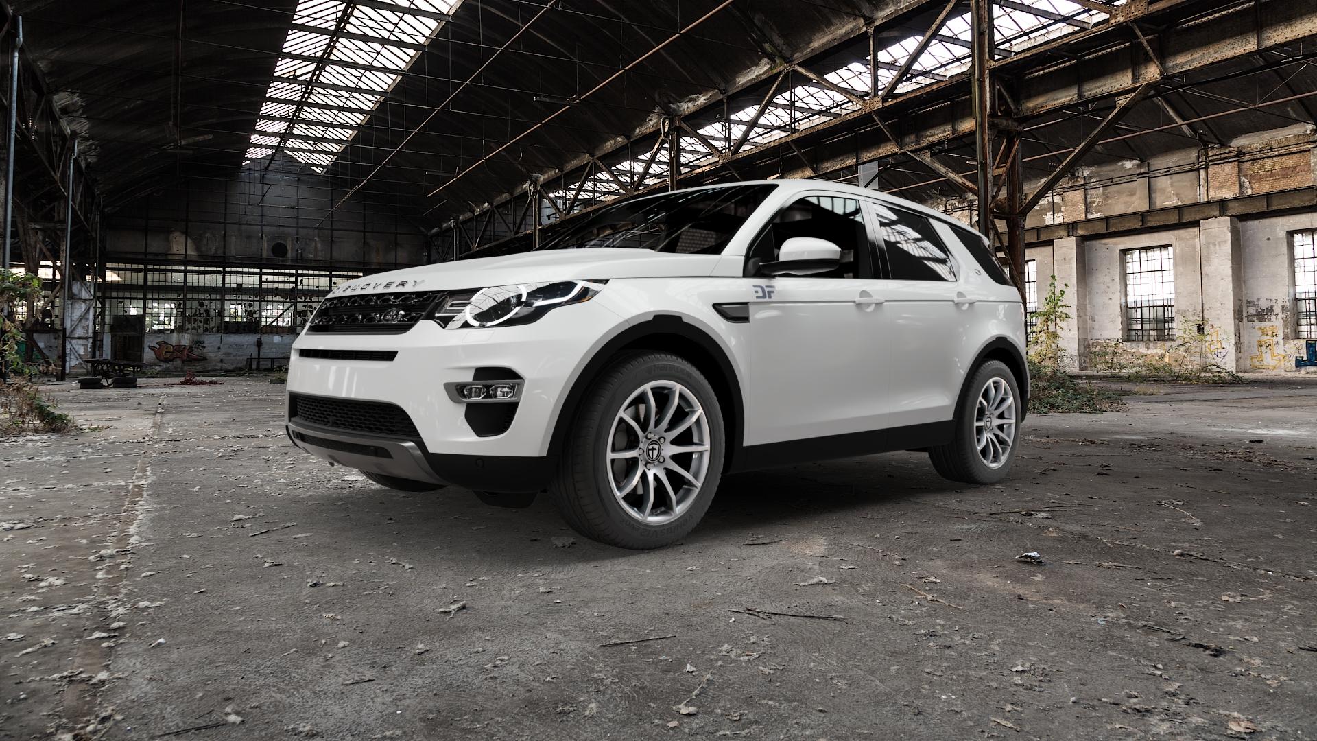 TOMASON TN1 bright silver Felge mit Reifen silber in 18Zoll Winterfelge Alufelge auf weissem Land Rover Discovery Sport Typ LC ⬇️ mit 15mm Tieferlegung ⬇️ Old Industrial Hall_max5000mm_2022 Frontansicht_1