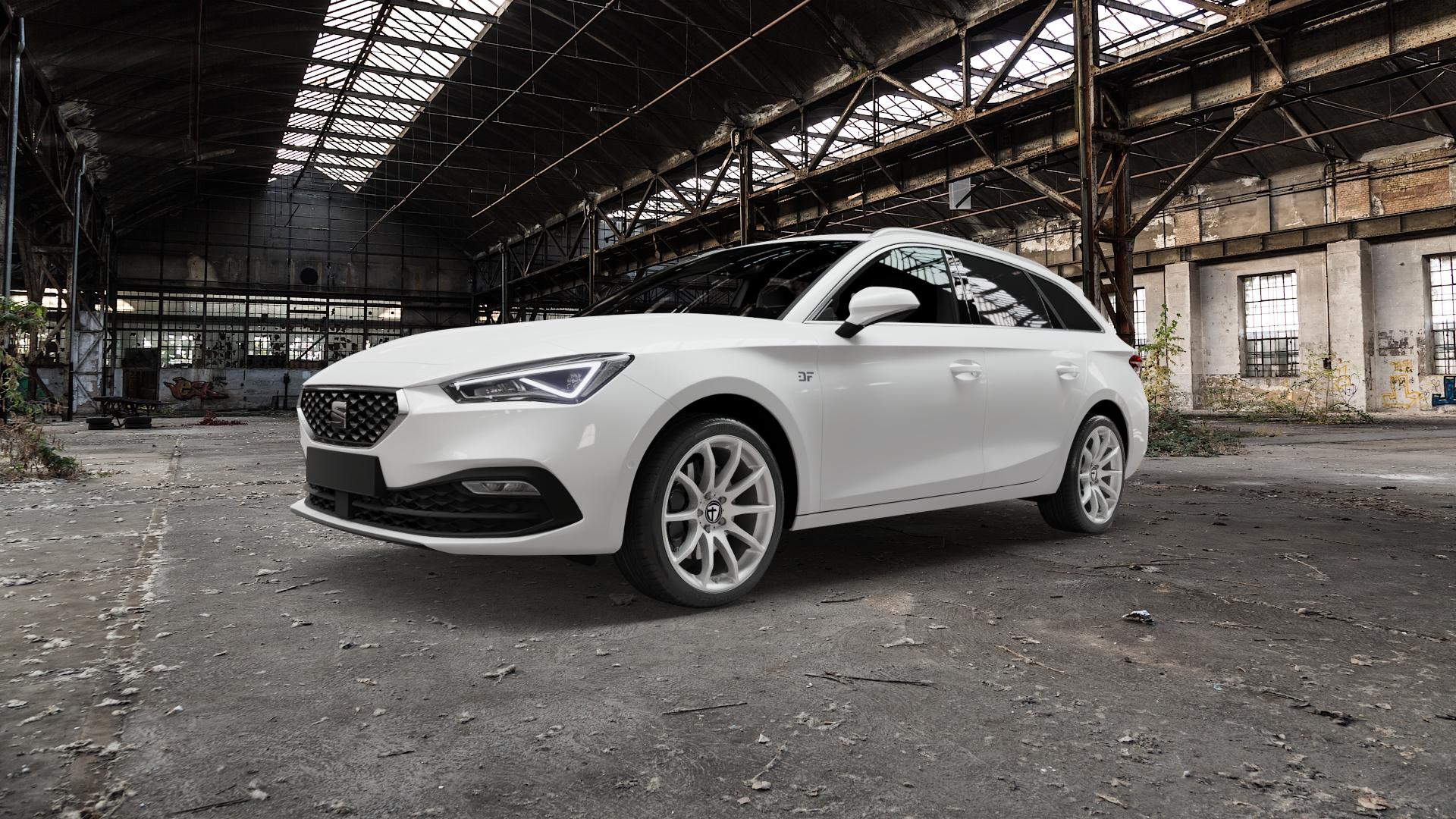 TOMASON TN1 bright silver Felge mit Reifen silber in 18Zoll Winterfelge Alufelge auf weissem Seat Leon Typ KL ST ⬇️ mit 15mm Tieferlegung ⬇️ Old Industrial Hall_max5000mm_2022 Frontansicht_1