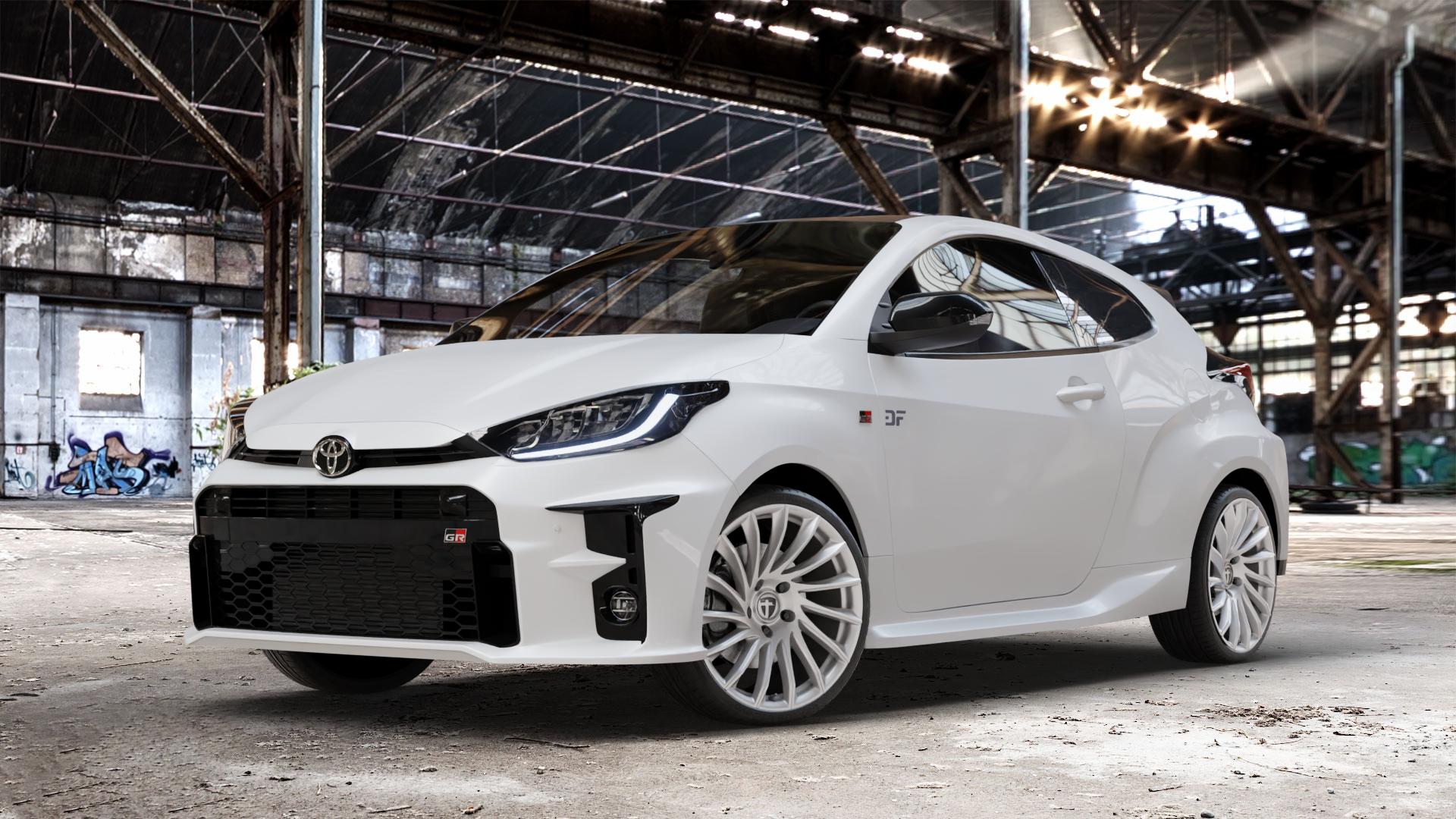 TOMASON TN16 bright silver Felge mit Reifen silber in 19Zoll Winterfelge Alufelge auf weissem Toyota Yaris IV Typ XPA1F(EU,M) l kW (0 PS) GR XPA1G(EU,M) ⬇️ mit 15mm Tieferlegung ⬇️ Old Industrial Hall_max_4400mm_2024 Frontansicht_1