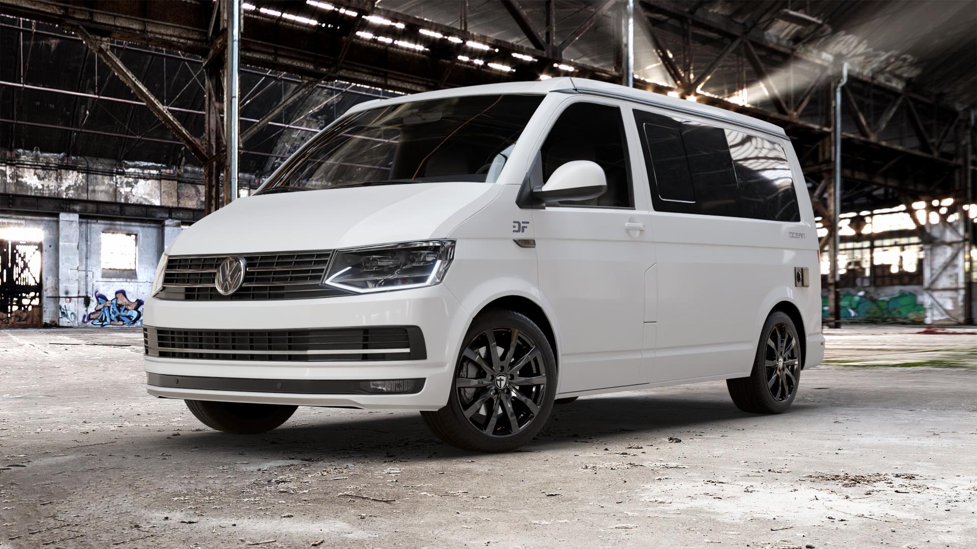 TOMASON TN28 Flow black painted Felge mit Reifen schwarz in 18Zoll Winterfelge Alufelge auf weissem Volkswagen (VW) T6 California Beach ⬇️ mit 15mm Tieferlegung ⬇️ Old Industrial Hall_max_5300mm_2024 Frontansicht_1