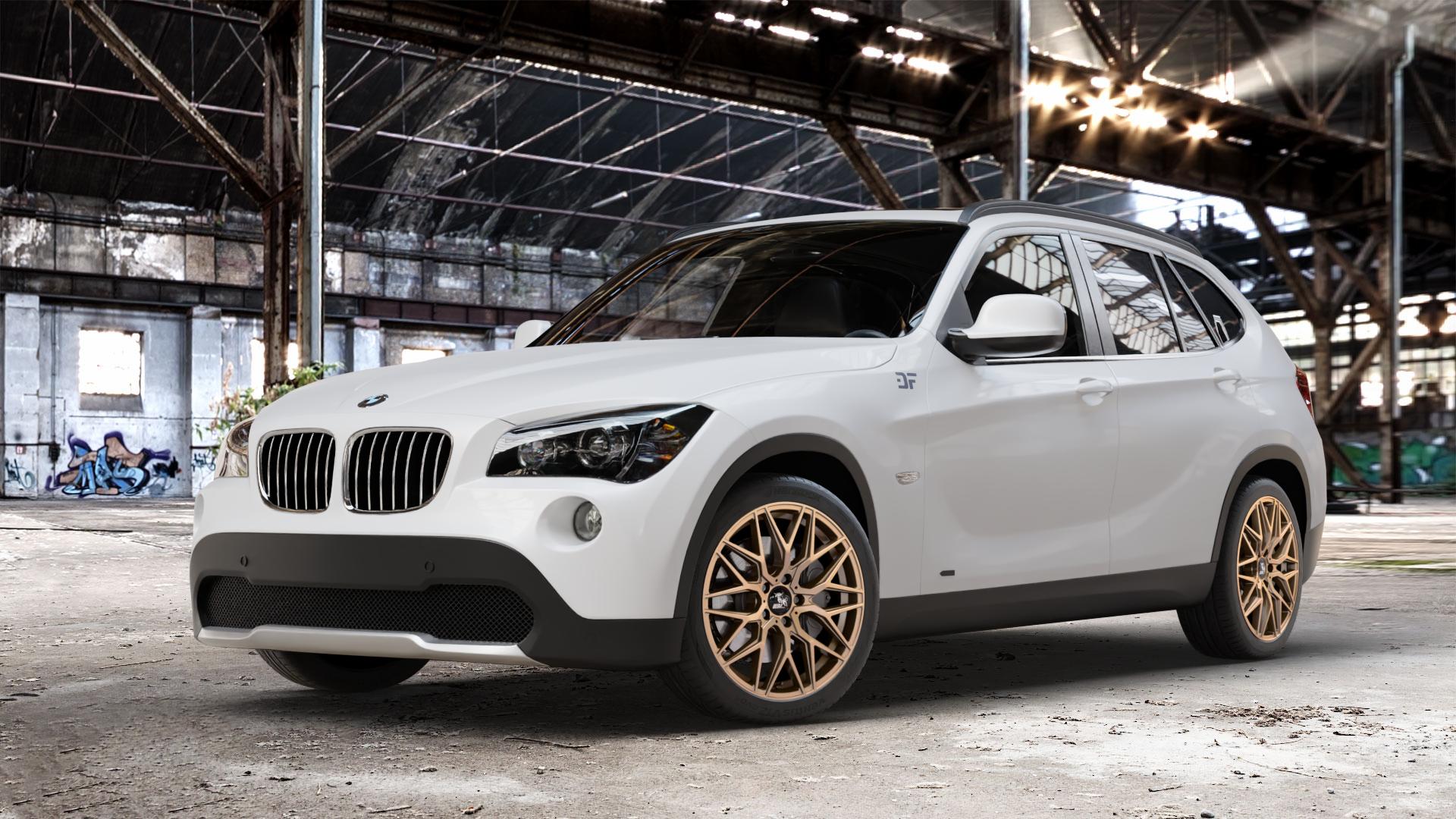 Ultrawheels UA1E BRONZE MATT Felge mit Reifen in 18Zoll Winterfelge Alufelge auf weissem BMW X1 Typ E84 (X1, X-N1, X1-N1) ⬇️ mit 15mm Tieferlegung ⬇️ Old Industrial Hall_max_4400mm_2024 Frontansicht_1