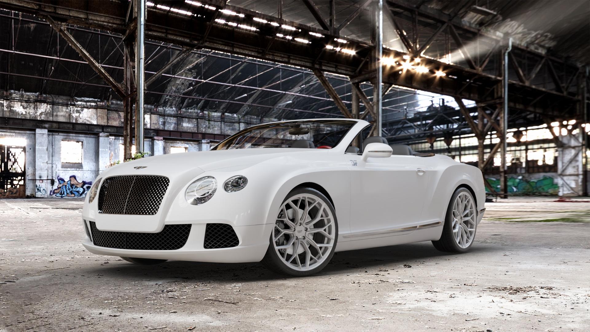 Wheelforce HE1-FF GLOSS STEEL Felge mit Reifen silber in 21Zoll Winterfelge Alufelge auf weissem Bentley Continental GTC Typ 3W ⬇️ mit 15mm Tieferlegung ⬇️ Old Industrial Hall_max_5300mm_2024 Frontansicht_1